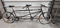 Full side view of tandem bicycle