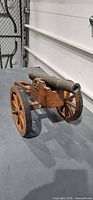 Side view of wood carriage cannon