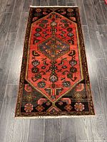 Full view of rug showing pattern, colours, dimensions context