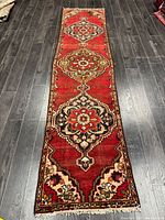 Full view of runner rug showing design and colours