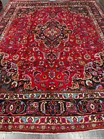 Full view of entire rug showing pattern and borders