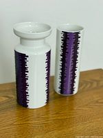 Front view of both vases showing geometric pattern