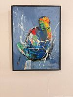 Front view of framed abstract painting showing colours and composition