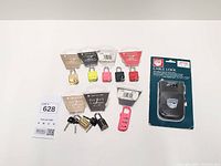 All nine Samsonite locks laid out including combination, keyed and cable lock.