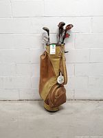 Full view of bag standing with clubs inside