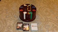 Wooden poker chip carousel, three decks of cards at front