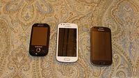 Three Samsung phones side by side