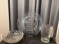 Group view of platter, bowl, pitcher