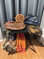 Group shot showing all five purses and scarf