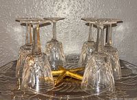 All six Waterford Lismore claret glasses inverted to show pattern