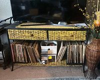 Front view of accent table showing drawers and shelf