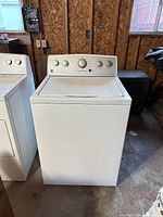 Front view of Kenmore Series 500 washer next to matching dryer