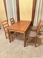 Dining table with four chairs assembled