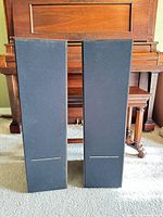 Front view of both Polk Audio RTA 8T speakers with grilles installed