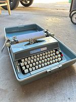 Front view of Signature 510 typewriter in case