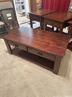 Full view of dark wood coffee table