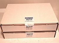 Two sealed cardboard boxes labeled 26210 2-5⁄8" x 1" 30 labels/sheet