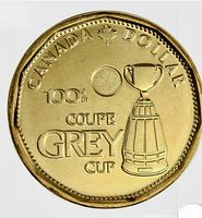 Reverse of 2012 Grey Cup commemorative loonie showing trophy and inscriptions