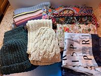 Group shot of all hats and scarves