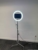 Front view of ring light with tablet on Kupo stand