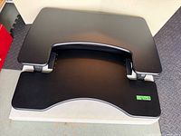 Front view of VariDesk ProPlus 36 showing two-tier surfaces