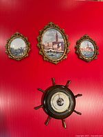 Front view of three brass convex frames and ship wheel barometer