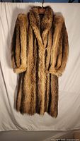 Front view of raccoon full-length fur coat