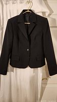Front view of Sisley black blazer