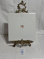 Front of album sleeve displayed on stand