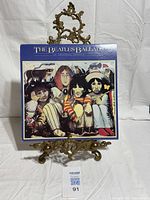 Front cover of album on stand