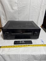 Front view of Pioneer VSX-324 receiver with remote