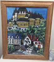 Frontal view of framed Old Quebec City oil painting