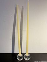 Pair of crystal sphere candle holders with tapers inserted