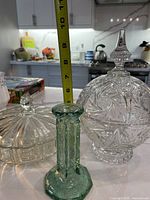 All three glass items together with measuring tape showing height of crystal candy dish
