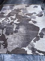 Full view of rug showing overall abstract floral pattern