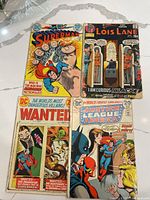 Group shot of all four comic books