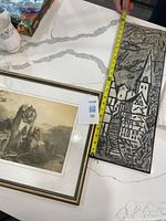 Both artworks side-by-side; tape showing painting height