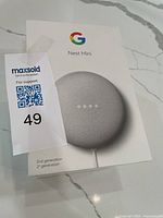 Front of retail box showing Google Nest Mini branding