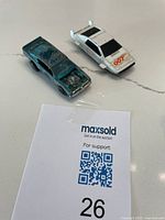 Both cars side by side, overall view