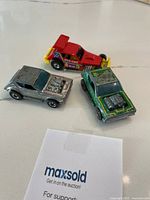 Group shot of three diecast cars