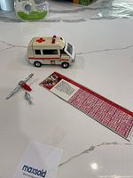 Ambulance figure with accessories and card
