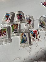 Group of eight sealed SkyBox miniature cards