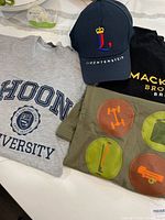 Group view of three T-shirts and Liechtenstein cap