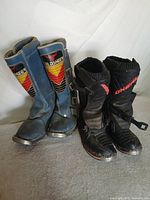 Both pairs of motorcycle boots side by side