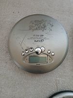 Silver GPX CD player with wear
