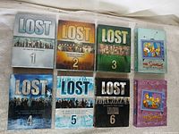 All eight boxed sets arranged in two rows