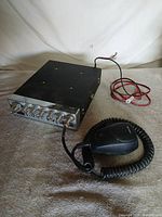 Top and front view of CB radio with microphone and power lead