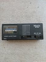 Front of Matrix SR-1000 tuner showing meter and controls
