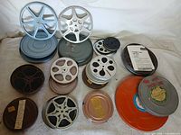 Overall lot showing assorted reels and cans