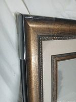 Corner close-up showing finish and mat detail